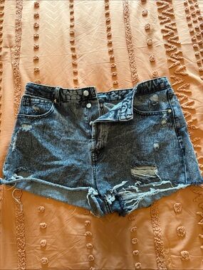 High-Rise Distressed Denim Shorts in Black Wash